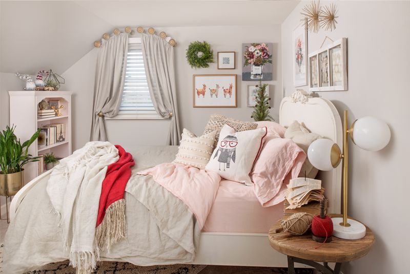 Fill the bed with cozy pillows and blankets.